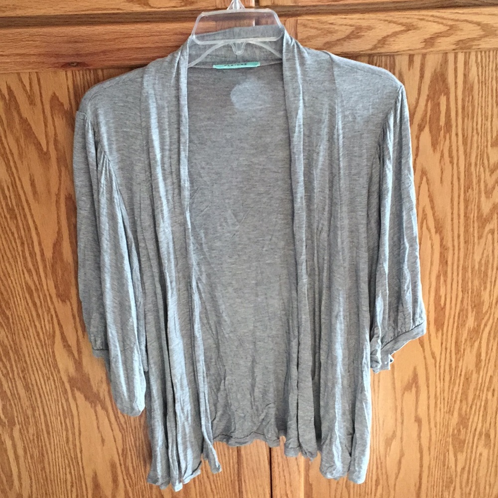 Grey shrug with large sleeves